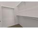 Large closet with double hanging rods and shelving at 13637 W Hackamore Dr, Peoria, AZ 85383