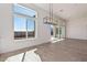 Bright dining area with large windows and hardwood floors at 13637 W Hackamore Dr, Peoria, AZ 85383