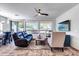 Spacious living room featuring comfortable seating and large windows at 36106 N Desert Tea Dr, San Tan Valley, AZ 85140