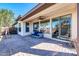 Relaxing covered patio with seating and built-in grill at 36106 N Desert Tea Dr, San Tan Valley, AZ 85140