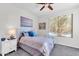 Bright bedroom with a comfortable bed and large window at 36106 N Desert Tea Dr, San Tan Valley, AZ 85140