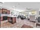 Bright and airy kitchen with an island, stainless steel appliances, and Gathering room view at 36106 N Desert Tea Dr, San Tan Valley, AZ 85140