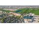 Community clubhouse with pool, tennis courts, and ample parking at 36106 N Desert Tea Dr, San Tan Valley, AZ 85140