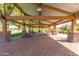 Covered picnic pavilion with multiple tables and benches at 4053 S Skyline Ct, Gilbert, AZ 85297