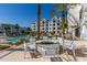 Resort-style pool with fire pit and seating area at 2511 W Queen Creek Rd # 205, Chandler, AZ 85248