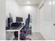 Home office with a desk, computer, and comfortable chair at 2511 W Queen Creek Rd # 205, Chandler, AZ 85248