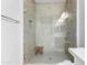 Spacious walk-in shower with glass enclosure and tiled walls at 2511 W Queen Creek Rd # 205, Chandler, AZ 85248