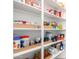 Well-organized pantry with ample shelving for storage at 2511 W Queen Creek Rd # 205, Chandler, AZ 85248