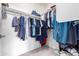 Large walk-in closet with ample hanging space and shelving at 2511 W Queen Creek Rd # 205, Chandler, AZ 85248