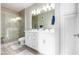 Modern bathroom with double vanity, large shower, and updated fixtures at 2511 W Queen Creek Rd # 205, Chandler, AZ 85248