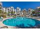 Inviting kidney-shaped swimming pool at 2511 W Queen Creek Rd # 205, Chandler, AZ 85248
