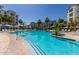 Resort-style pool with ample lounge chairs at 2511 W Queen Creek Rd # 205, Chandler, AZ 85248