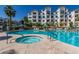 Resort-style pool and spa with comfortable lounge chairs at 2511 W Queen Creek Rd # 205, Chandler, AZ 85248