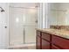 Bathroom with granite countertop and walk-in shower at 4548 E Carob Dr, Gilbert, AZ 85298