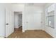 Bedroom with sliding closet doors and neutral decor at 4548 E Carob Dr, Gilbert, AZ 85298