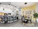 Modern kitchen with island seating and a dining area at 8132 W Hatfield Rd, Peoria, AZ 85383