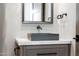 Modern bathroom with a sleek concrete sink and marble vanity at 9989 E Aleka Way # 337, Scottsdale, AZ 85262