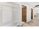 Bright entryway with built-in bench seating and storage at 9989 E Aleka Way # 337, Scottsdale, AZ 85262