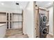 Spacious laundry room with washer, dryer, and ample cabinetry at 9989 E Aleka Way # 337, Scottsdale, AZ 85262