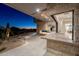 Covered patio with firepit, pool, and sunset views at 9989 E Aleka Way # 337, Scottsdale, AZ 85262