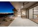 Luxury patio at night with a pool and sunset view at 9989 E Aleka Way # 337, Scottsdale, AZ 85262