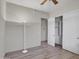 Well-lit bedroom with spacious closet and tile flooring at 1841 E Gary Way, Phoenix, AZ 85042