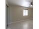 Spacious bedroom with large window and tile floors at 30240 N 60Th St, Cave Creek, AZ 85331