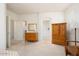 Spacious bedroom with built in wooden wardrobe and dresser at 17826 N Encanto Dr, Surprise, AZ 85374