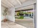 View of backyard oasis through sliding glass doors from inside at 8643 E San Jacinto Dr, Scottsdale, AZ 85258