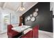 Unique dining space with retro-style seating and a view of the backyard at 8643 E San Jacinto Dr, Scottsdale, AZ 85258