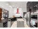Modern kitchen with stainless steel appliances and granite countertops at 8643 E San Jacinto Dr, Scottsdale, AZ 85258