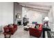 Spacious living room with fireplace and hardwood floors at 8643 E San Jacinto Dr, Scottsdale, AZ 85258