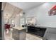 Open kitchen features island and view into dining area at 8643 E San Jacinto Dr, Scottsdale, AZ 85258