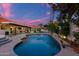 Inviting kidney shaped pool with water features and patio at 8643 E San Jacinto Dr, Scottsdale, AZ 85258