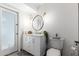 Clean bathroom featuring a white vanity, toilet, and large mirror at 8643 E San Jacinto Dr, Scottsdale, AZ 85258