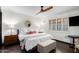 Main bedroom with a king-size bed and plenty of natural light at 8643 E San Jacinto Dr, Scottsdale, AZ 85258
