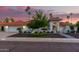 Stunning curb appeal with a well-landscaped yard and inviting entryway at 8643 E San Jacinto Dr, Scottsdale, AZ 85258