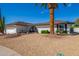 Front view of a single story home with a two car garage at 12910 W Rampart Dr, Sun City West, AZ 85375