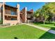Condo building with walkway and landscaping at 5525 E Thomas Rd # F9, Phoenix, AZ 85018