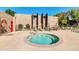 Relaxing community hot tub with surrounding seating at 5525 E Thomas Rd # F9, Phoenix, AZ 85018