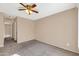 Spacious bedroom with ceiling fan and neutral walls at 5525 E Thomas Rd # F9, Phoenix, AZ 85018