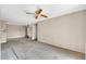 Living room with ceiling fan and access to kitchen at 5525 E Thomas Rd # F9, Phoenix, AZ 85018