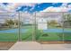 View of pickleball courts with rules posted at 11526 E Milagro Ave, Mesa, AZ 85209