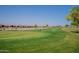 Aerial view of a lush green golf course at 11526 E Milagro Ave, Mesa, AZ 85209