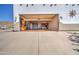 Large garage with ample storage space and workshop area at 3333 N 87Th St, Mesa, AZ 85207