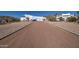 Long driveway leading to a beautiful desert home at 3333 N 87Th St, Mesa, AZ 85207