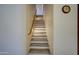 Modern staircase with wood and gray laminate at 3333 N 87Th St, Mesa, AZ 85207