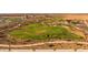 Aerial view of a fenced dog park with agility features and benches at 1252 W J Waltz Way, Apache Junction, AZ 85120