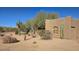 Landscaped yard with cacti and desert plants surrounds this Southwestern style home at 2926 W Tanya Trl, Phoenix, AZ 85086