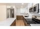 Renovated kitchen with quartz countertops and stylish cabinetry at 4848 N Woodmere Fairway -- # 15, Scottsdale, AZ 85251